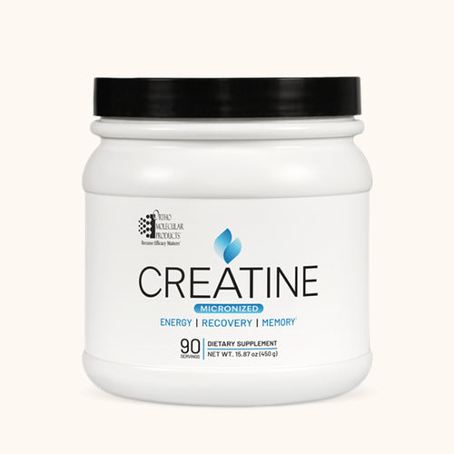 White container of Ortho Molecular creatine supplement with black lid on a white background.
